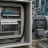 IoTize Smart Machine Health Monitor installed in industrial control panel for motor predictive maintenance